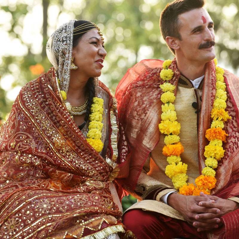 Couple celebrating an Indian wedding ceremony in Vermont