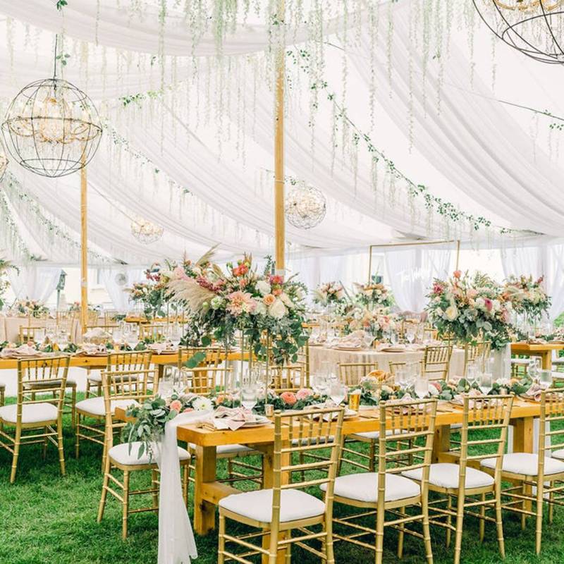 Elegant wedding tent set up with chandeliers in Vermont