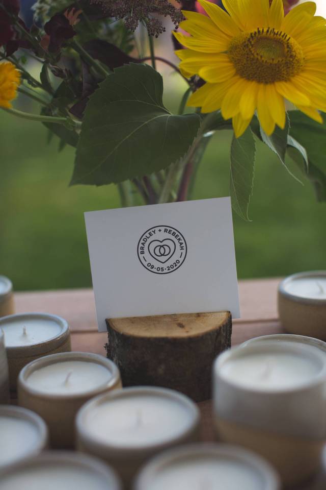 A place card for wedding with custom logo with a heart for a Vermont wedding
