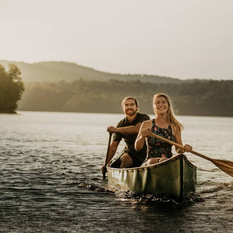 adventurous engagement session with couples in a canoe